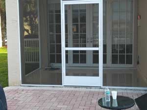 Tropical pool enclosure installation in Miami-Dade County