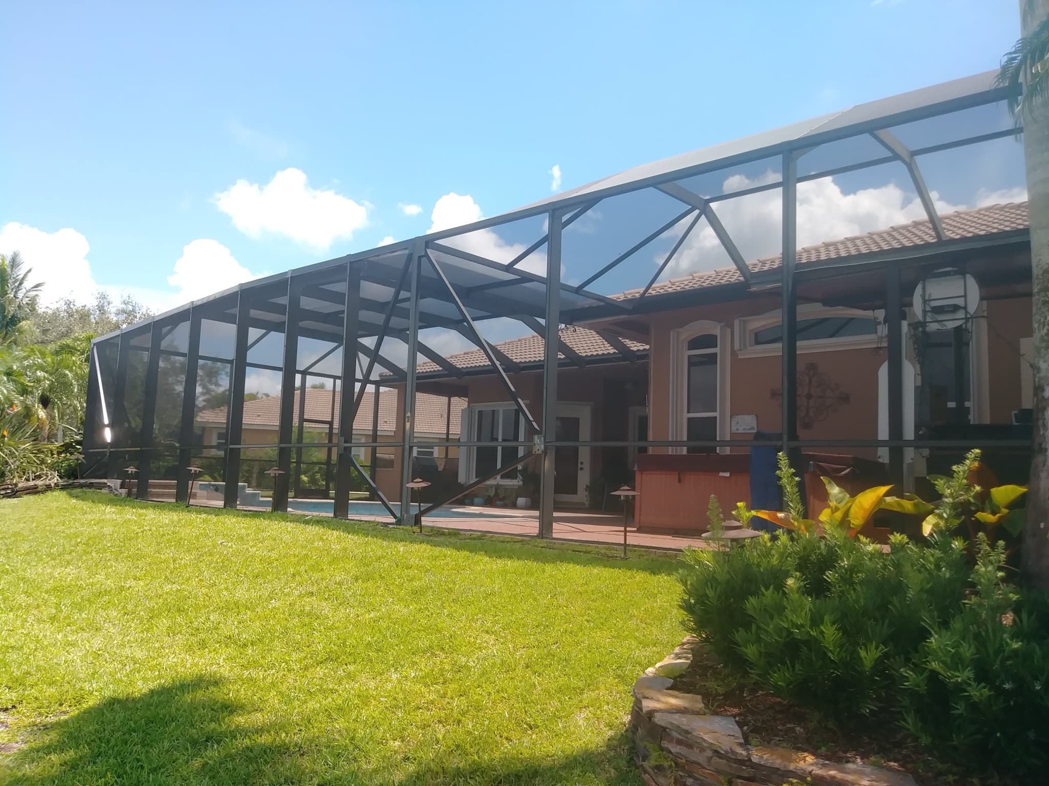 Modified mansard pool enclosure we built in Parkland