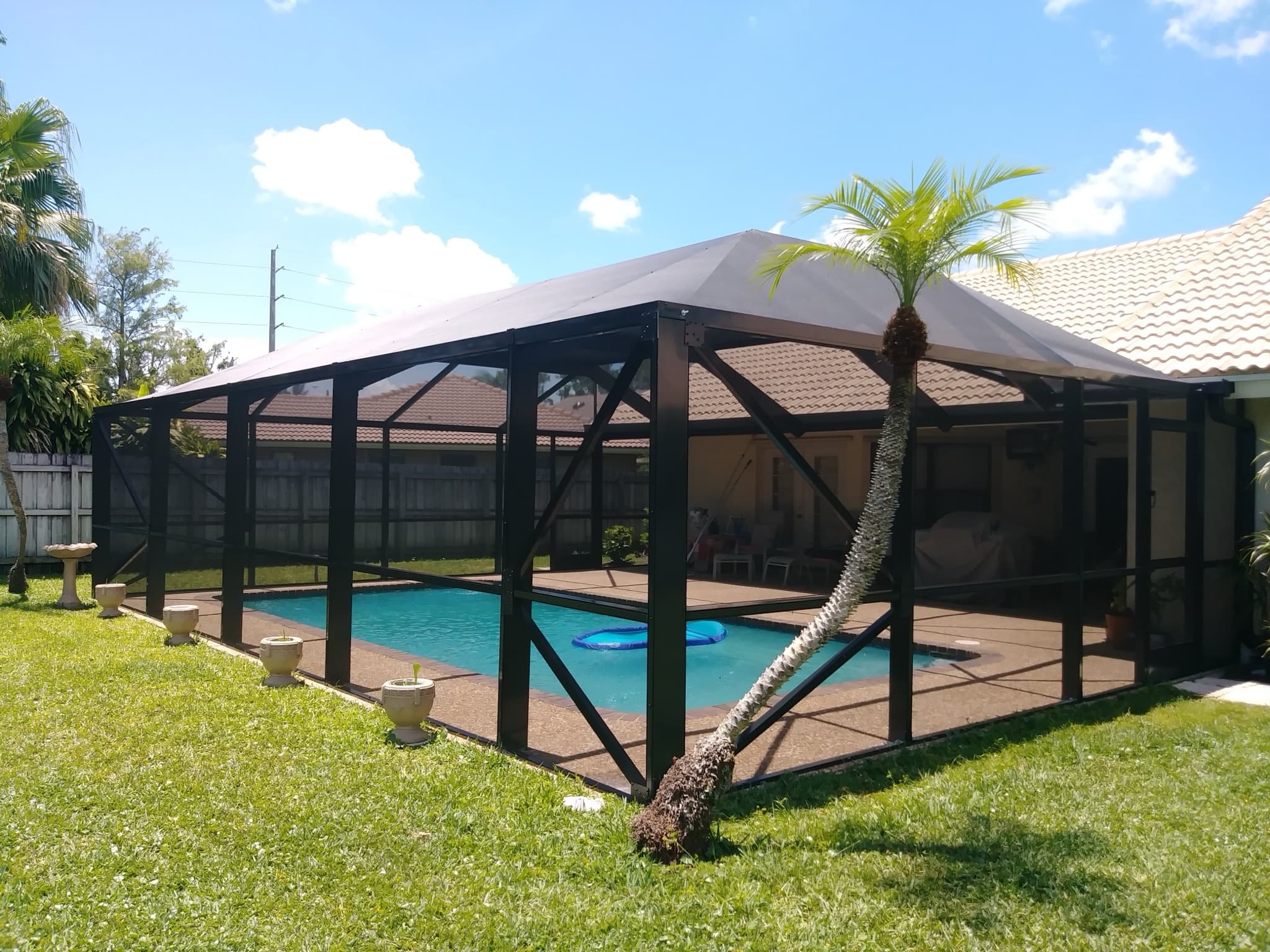 Pool enclosure installation progress, photo 25