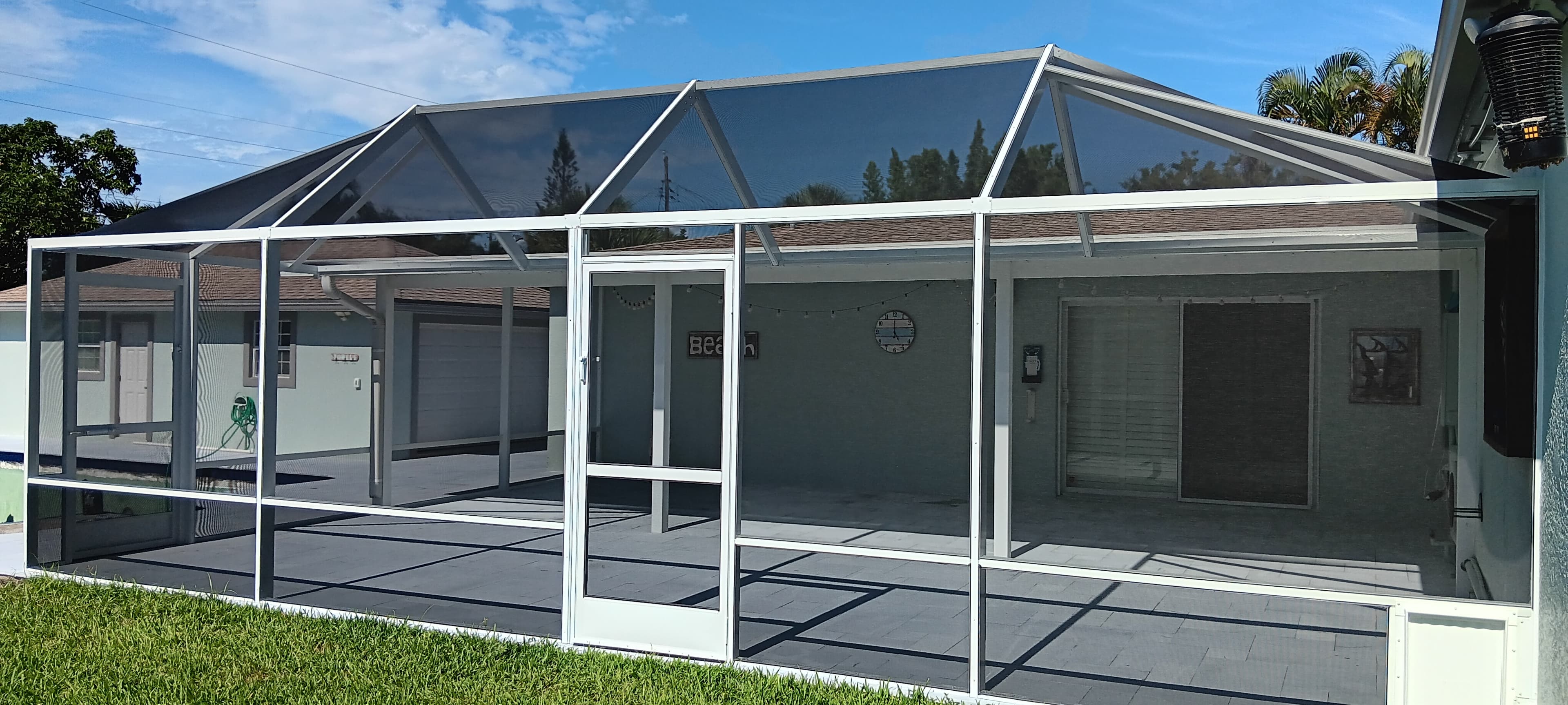 White aluminum lanai enclosure in Palm Beach County